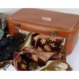 Brown leather suitcase and contents of ladies clothing to include scarves and gloves (qty)