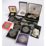 Collection of coins, to include cased Crowns, Rhodesia coin set, Johannesburg Tram tokens, part Bank