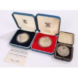 Two silver proof Crowns, 1977 and Charles and Diana, together with a Royal Visit medal for 1947, (