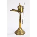 19th Century brass whale oil lamp, with lift up lid and conical base, 33cm high