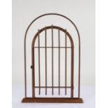 Charming iron model gate, the arched top above the gate with bars, 43cm wide, 63cm high