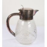 Silver plated glass lemonade/cocktail jug, the plated mount with shaped thumbpiece and loop