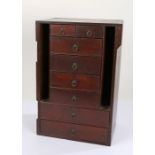 19th Century mahogany table top bank of drawers, having two short drawers with sliding lids, above