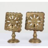 Pair of 19th Century brass candle reflectors, the tilting pierced square tops raised on waisted
