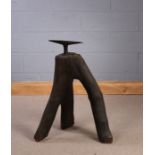 19th Century anvil, the iron anvil above the tripod trunk base, 80cm high