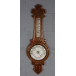 Early 20th Century oak barometer, with porcelain register and dial (missing glass face), 90cm tall