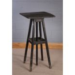 Sculpture stand, the revolving square top above am angled stand united by an under tier, 102cm high,