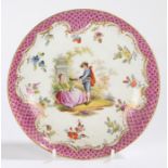 Meissen porcelain saucer dish, centred with a courting couple surrounded with flowers with a pink