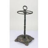 Victorian umbrella stand, painted in dark green with an circular top and loop handle above a shell
