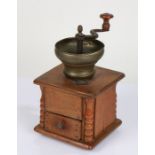 19th century oak coffee grinder, with brass hopper and drawer to the base, 29.5cm high