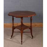 Edwardian mahogany and satinwood inlaid table, the octagonal top centred with an inlaid floral