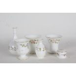 Wedgwood Mirabelle pattern porcelain, to include campagna shaped vase, four other vases, pot and