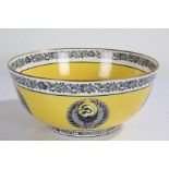 Wedgwood Celtic type pattern bowl, with a floral scrolling band above Crane motifs on yellow ground,