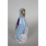Herend porcelain figure depicting a parrot with blue scale decoration to the body, incised 5006 to