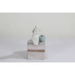 Lladro highland terrier, modelled seated on a stool, 11cm high