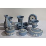 Collection of Wedgwood Jasperware, to include a clock, urns, dishes, vases, a bowl, and others (