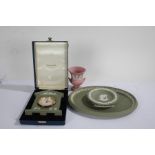 Wedgwood green jasperware, to include mantel clock, of architectural form, in original box, oval