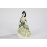 Royal Doulton figurine 'Sandra', HN2401, wearing a green dress, 22cm tall