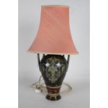 Royal Doulton Lambeth table lamp, with twin carrying handles and decorated in the Art Nouveau