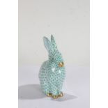 Herend porcelain rabbit, in the green fishnet pattern, modelled in a seated position, 13.5cm high