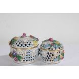 Two Dresden porcelain pot pourri vases and covers, each with pierced lids and floral encrusted