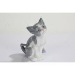 Lladro cat, in grey and white, modelled in a seated position, 13.5cm high