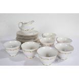 Quantity of Royal Doulton Fairfax tea cups and saucers, with side plates (qty)