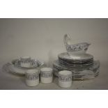 Wedgwood Dolphins porcelain dinner service, R4652, to include a gravy boat and dish, a serving dish,