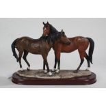 Leonardo Collection horse figure group, on a wooden base, 42cm wide