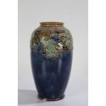 Royal Doulton stoneware vase, painted with fruit on a blue ground, initialled MB to base and