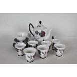 Royal Albert Masquerade pattern coffee service, consisting of six coffee cups and saucers, four side