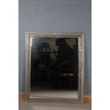 Large modern bevel edged wall mirror with silvered frame, 133cm wide x 110cm high