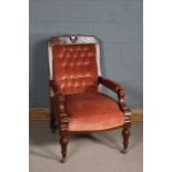 Late Victorian open armed arm chair with a shell motif to the top, upholstered in pink fabric and