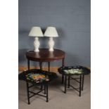 Early 20th Century dining table, the circular top above a carved frieze, raised on four gadrooned