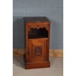 Late Victorian mahogany pot cupboard, with carved frieze and foliate carved door, 79cm high