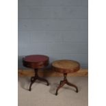 Two drum tables, one of which has a hinged top and faux draws above a turned column the other has