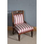 Victorian walnut nursing chair, with inlaid around the edge of the chair, red and white