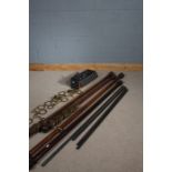 Four wooden curtain poles together with four metal poles