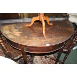 19th Century mahogany demi lune table, above square section legs and spade feet