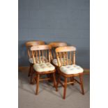 set of Four spindle chairs, with dished seats above turned legs