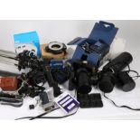 Camera accessories to include a Silk 88 tripod, lens cases, light, Vivitar flash, batteries, and