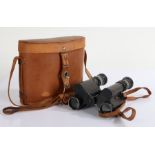 Huet Paris Extra Lumineuse 8x binoculars, housed in a non-contemporary brown leather case