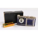 Kunik Walter Petie Vanity sub-miniature camera, with a blue enamel and chrome edged body, a sprung