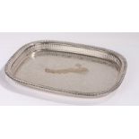 Silver plated tray with gadrooned and pierced border, the central field with acanthus leaf and