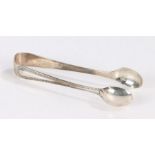 Pair of late Victorian silver sugar tongs, Birmingham 1899, maker William Devenport, with beaded old