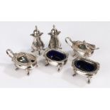 Silver plated condiment set, consisting of two salts with blue glass liners, two pepperettes and two