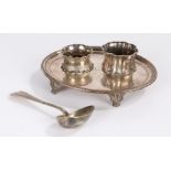 Plated ware to include oval card tray with beaded border raised on four shell cast feet, two