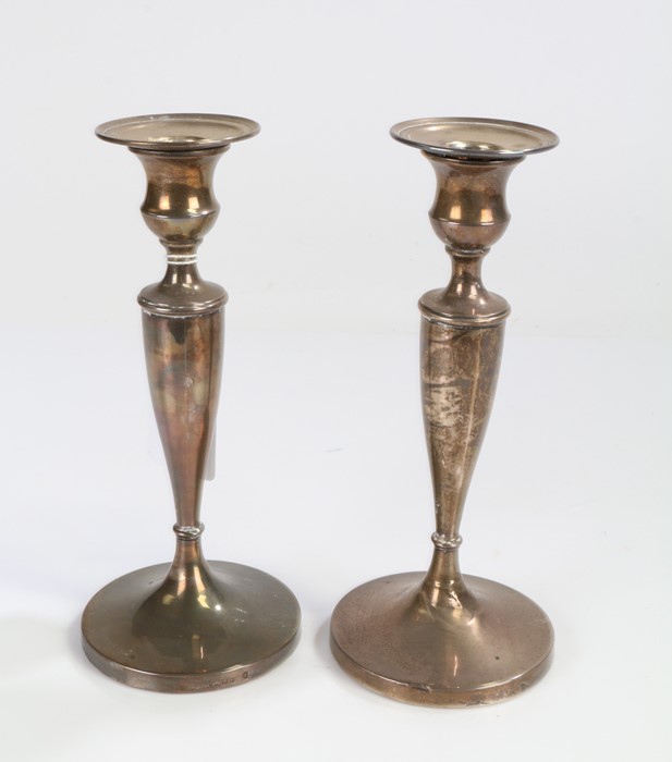 Pair of George V silver candlesticks, London 1930, maker William Comyns & Sons Ltd. the detachable