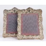 Pair of R.C Sheffield silver plated picture frames, with embossed foliate and scroll decorated