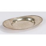 George V silver oval pin dish, Birmingham 1912, maker Mappin & Webb, with leaf decorated border